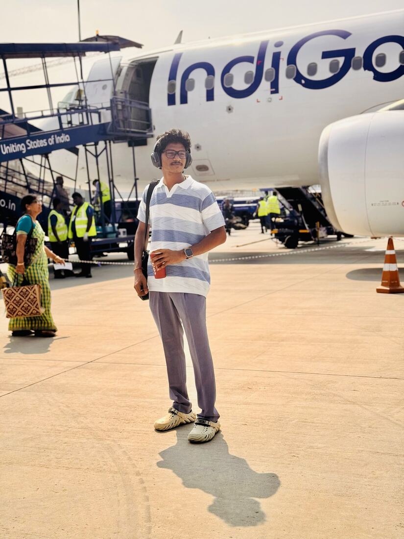 On the tarmac beside an IndiGo aircraft