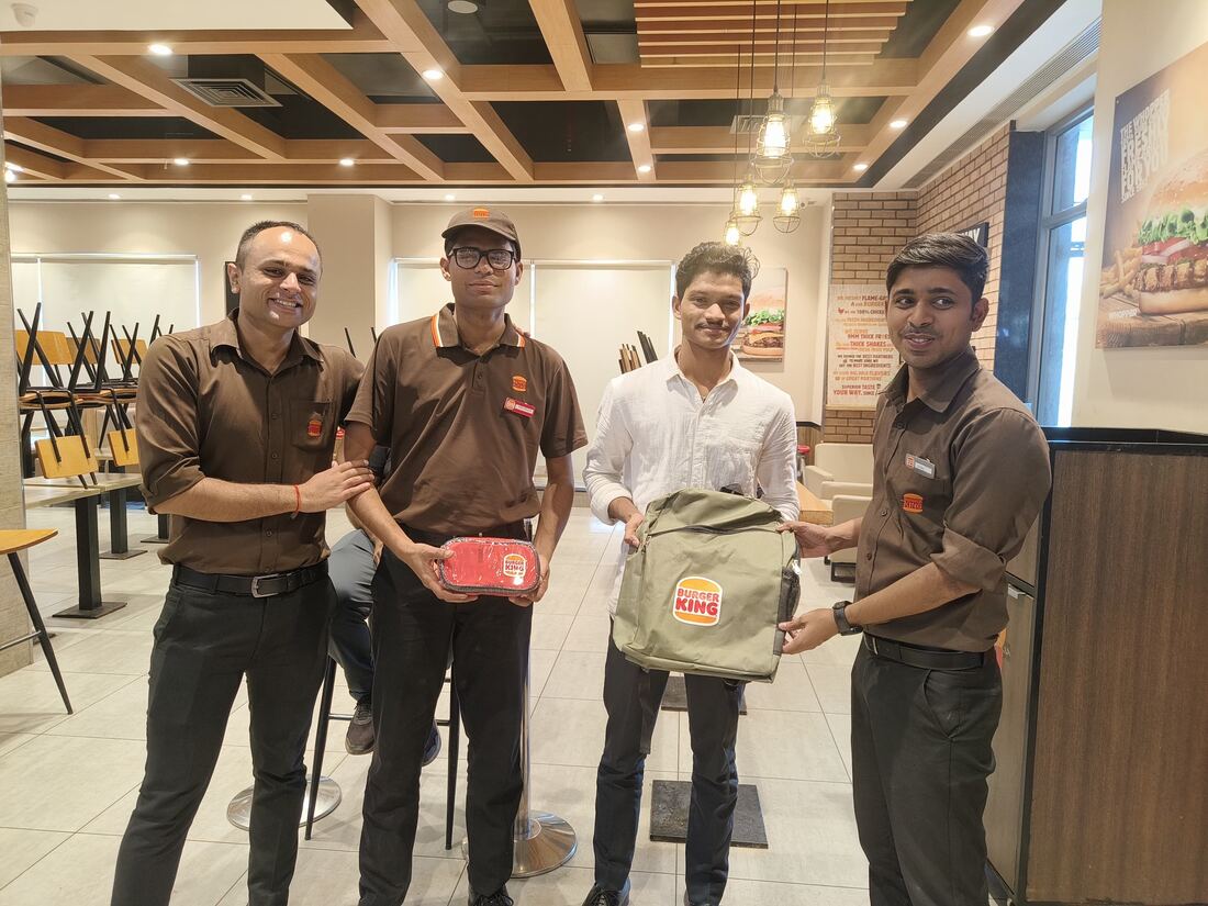 With a team at a restaurant
